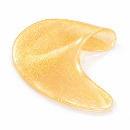 Close-up texture of thin Gold Hydrogel Under Eye Patch with soft flexible gel material