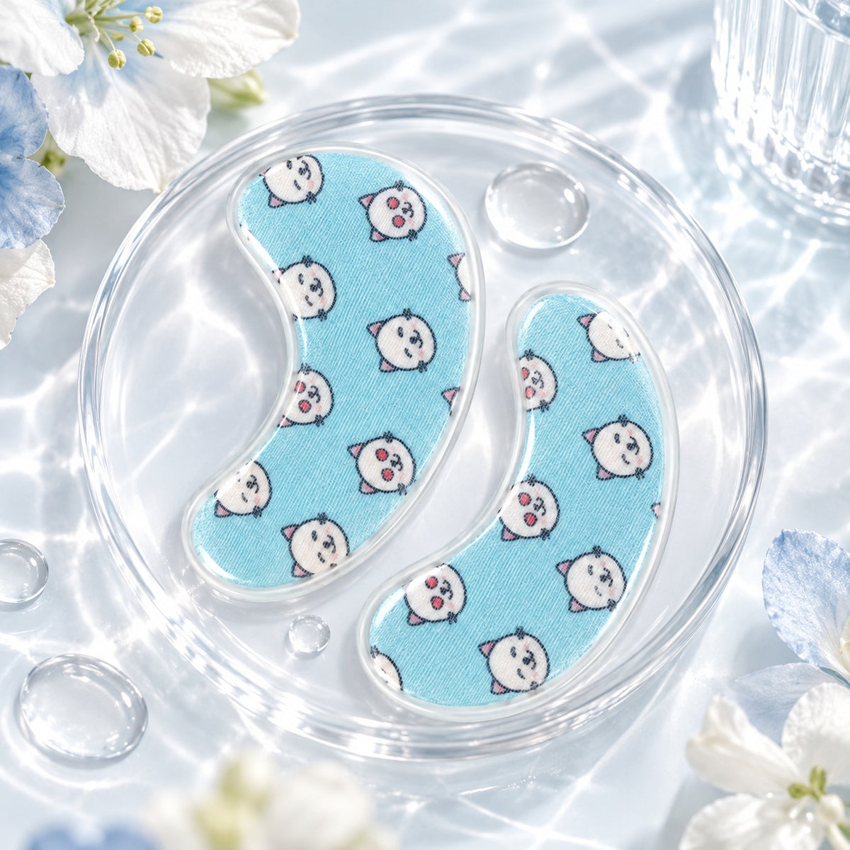 Kitty Fun blue printed hydrogel eye patches in a fresh skincare lifestyle setting