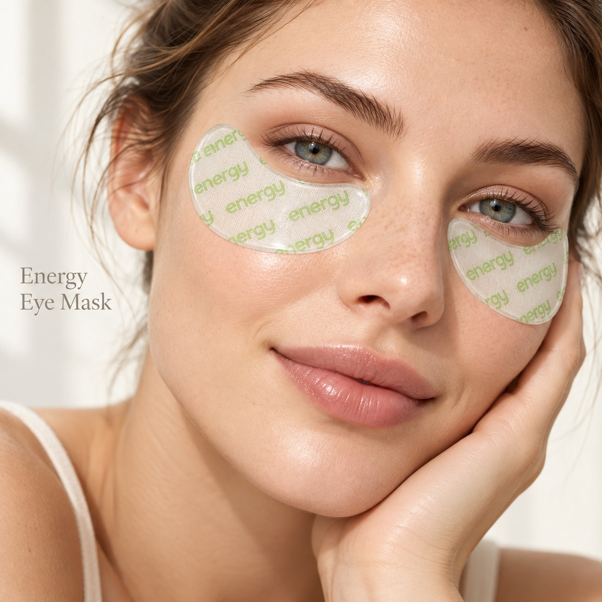 Female model wearing custom printed Energy hydrogel under eye patches