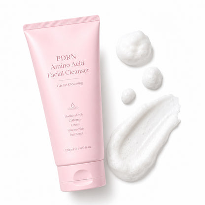 White creamy texture of PDRN amino acid facial cleanser beside the pink tube