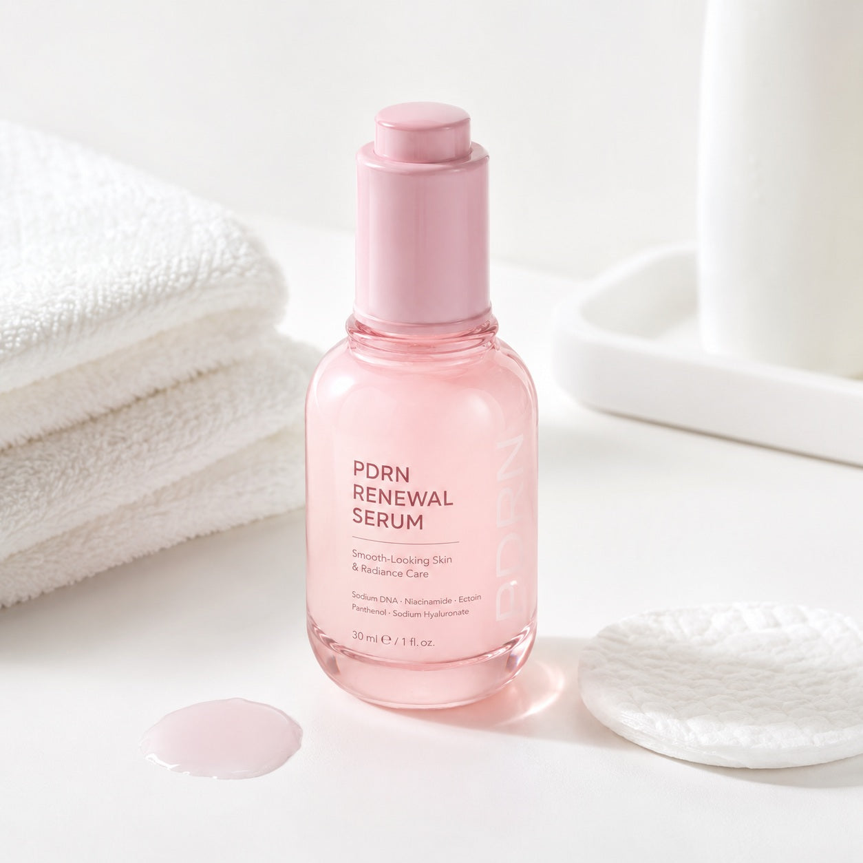 PDRN Renewal Serum in a clean daily skincare setting with cotton pads and towels