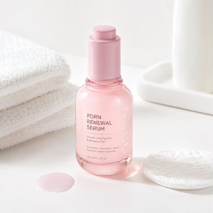 PDRN Renewal Serum in a clean daily skincare setting with cotton pads and towels