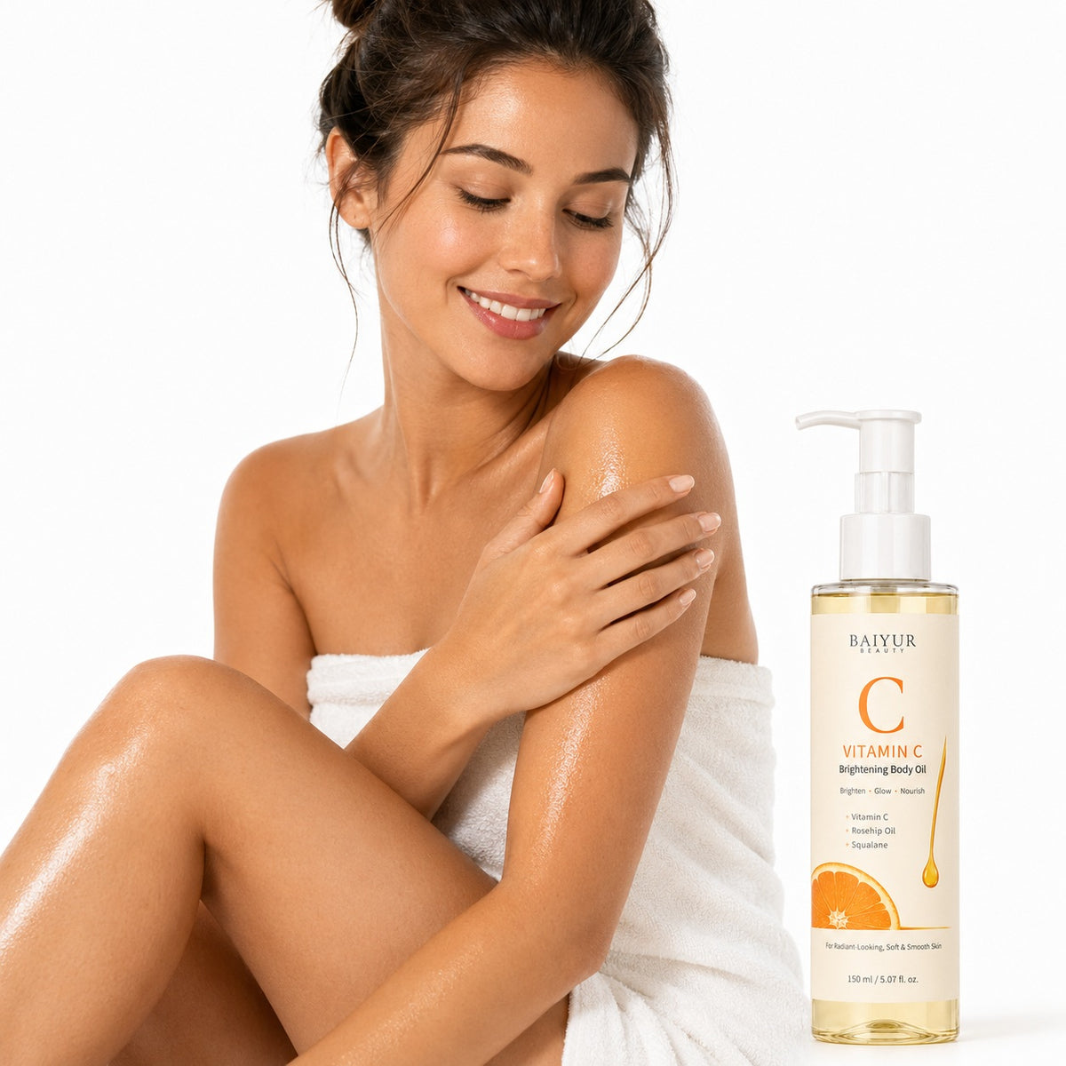 Model applying Baiyur Beauty Vitamin C Brightening Body Oil for soft smooth and radiant-looking skin